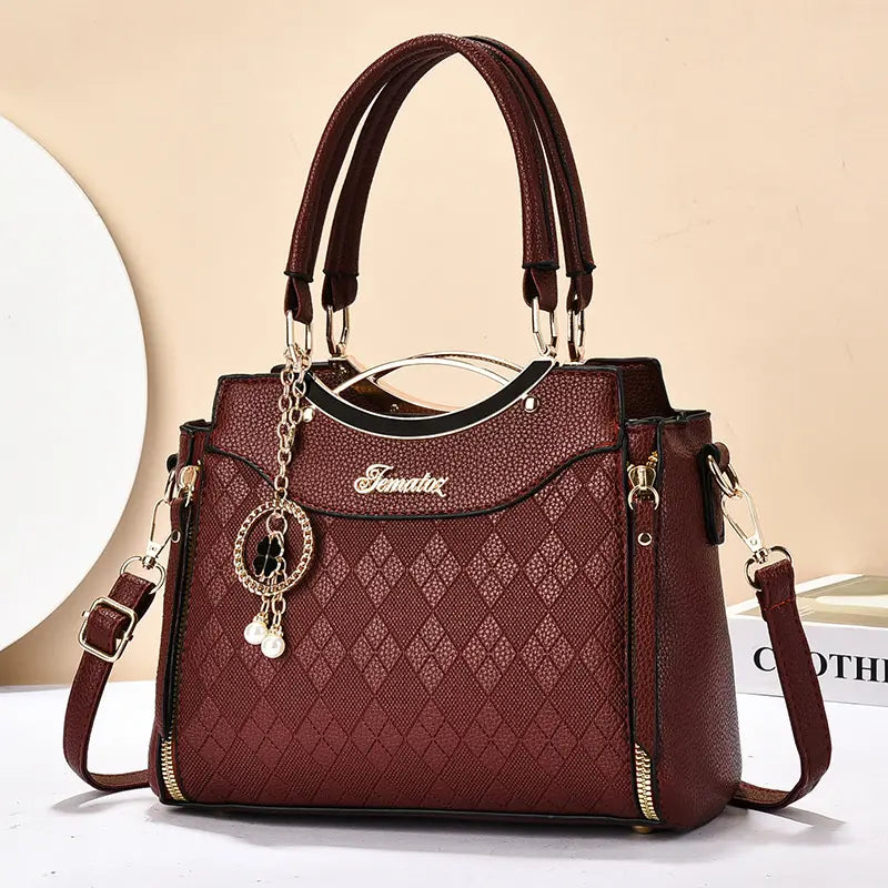 🥰Bolso bandolera para mujer con herrajes dorados, múltiples compartimentos y asa superior.