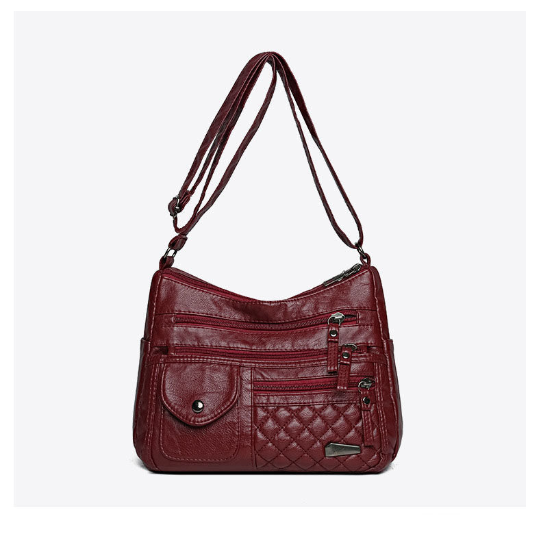 🔥【Oferta por tiempo limitado. Rebajas de fin de año.】Bolso de cuero suave de gran capacidad y múltiples capas para mujer