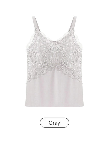 Esta elegante camisola está confeccionada en tejido transpirable de seda helada y presenta una silueta en línea A que disimula perfectamente el abdomen.