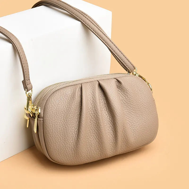 ✨🎀Bolso bandolera de piel con varios compartimentos y forma de concha
