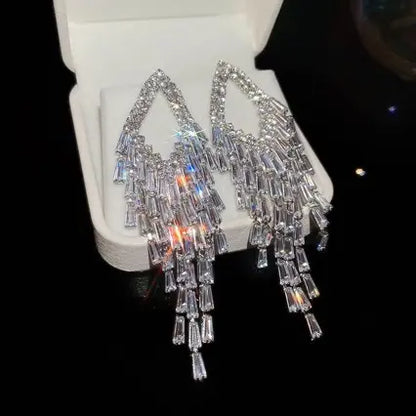💎 ¡50% de descuento! ✨ Pendientes de circonita cúbica: en forma de lágrima, con borlas y un brillo elegante ✨