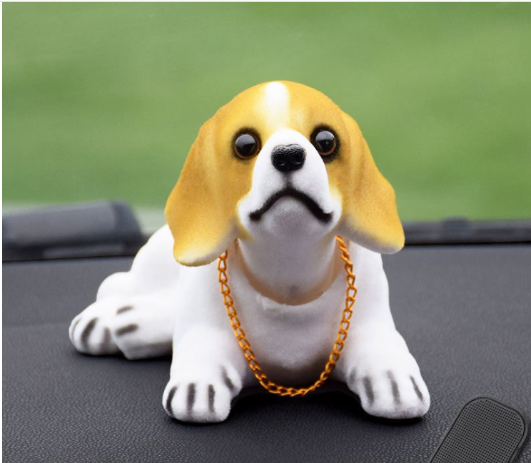 ¡El perro lindo y dominante con la cabeza temblorosa te acompañará para ser próspero en todo momento!