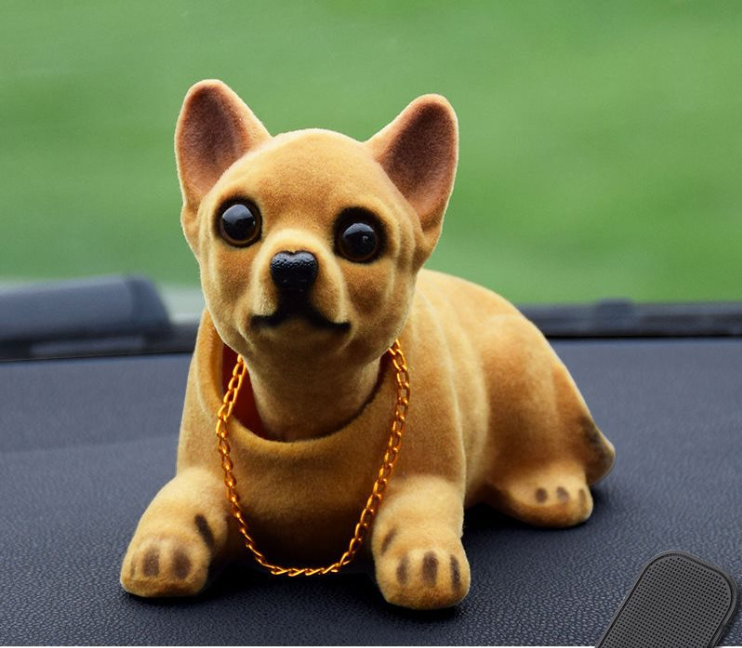 ¡El perro lindo y dominante con la cabeza temblorosa te acompañará para ser próspero en todo momento!