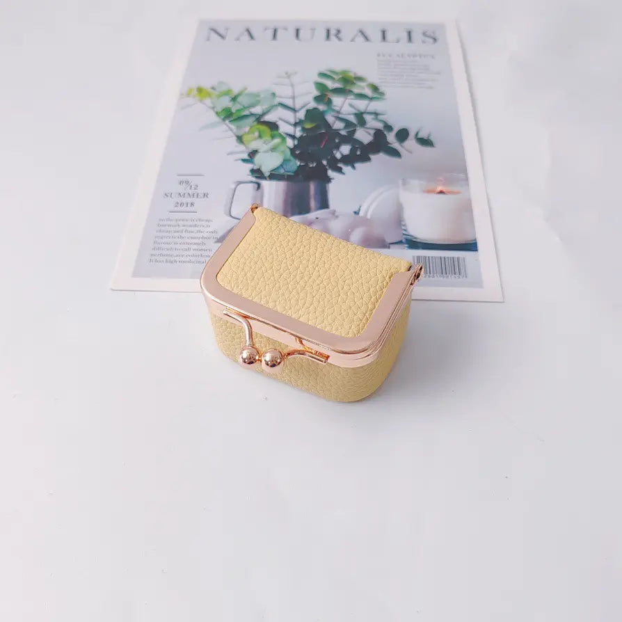 🎁【Compra 1 y llévate 1 gratis】💍👜Exquisita y compacta bolsita para joyas, ideal para guardar anillos, pendientes y otras joyas.