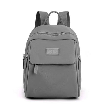 Nueva mochila elegante e informal de gran capacidad y color liso para mujer.