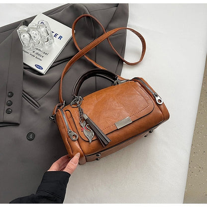 Bolso bandolera para mujer con diseño de borlas de estilo retro y patchwork de color liso, 2026