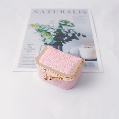 🎁【Compra 1 y llévate 1 gratis】💍👜Exquisita y compacta bolsita para joyas, ideal para guardar anillos, pendientes y otras joyas.