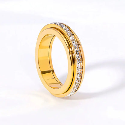Anillo giratorio Rotation Bar en acero de titanio con circonita