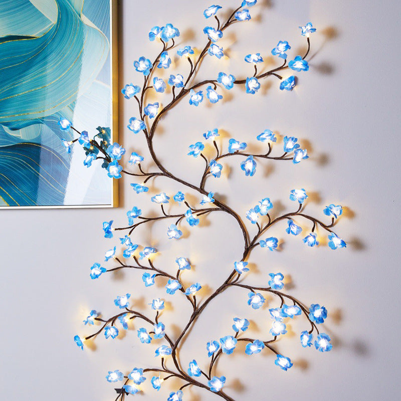 Las lámparas LED con forma de flor de melocotón se utilizan para decorar las paredes interiores y crear un ambiente romántico.