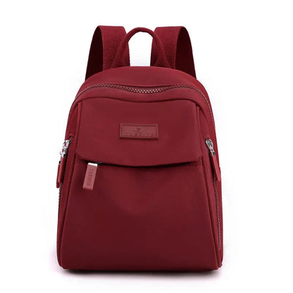 Nueva mochila elegante e informal de gran capacidad y color liso para mujer.