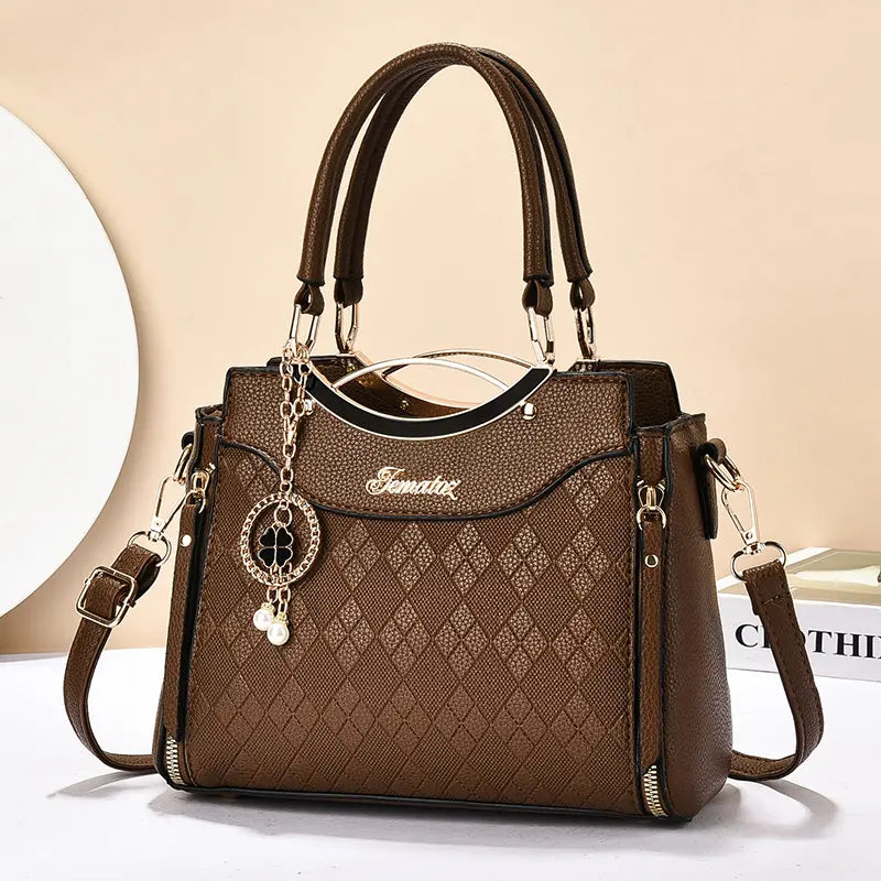 🥰Bolso bandolera para mujer con herrajes dorados, múltiples compartimentos y asa superior.