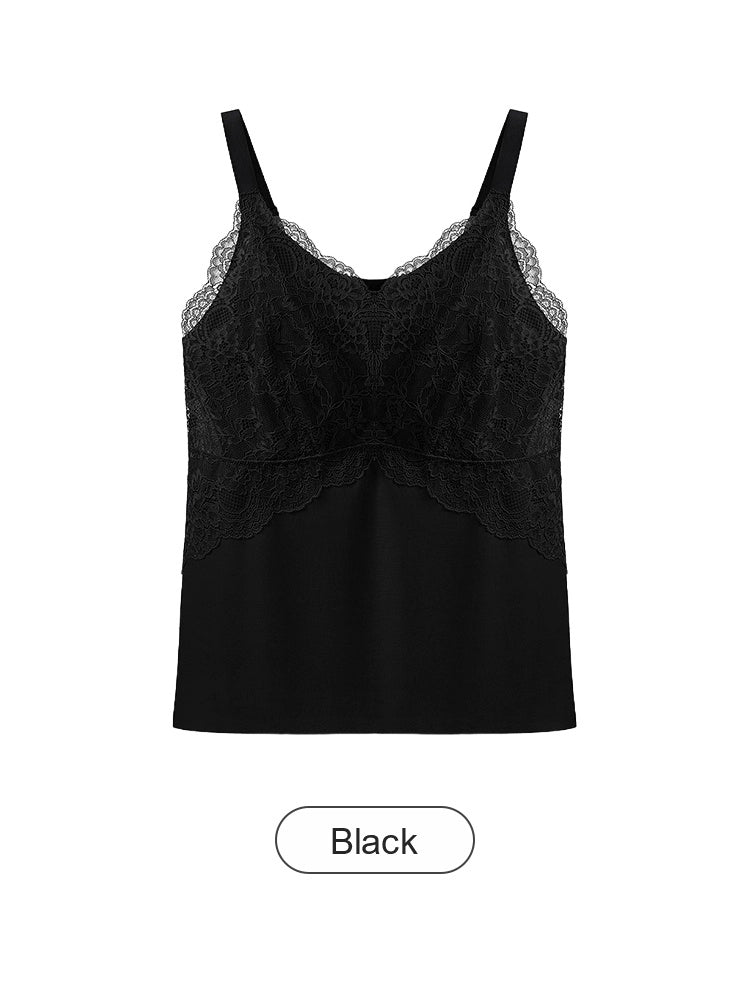 Esta elegante camisola está confeccionada en tejido transpirable de seda helada y presenta una silueta en línea A que disimula perfectamente el abdomen.