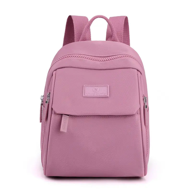 Nueva mochila elegante e informal de gran capacidad y color liso para mujer.