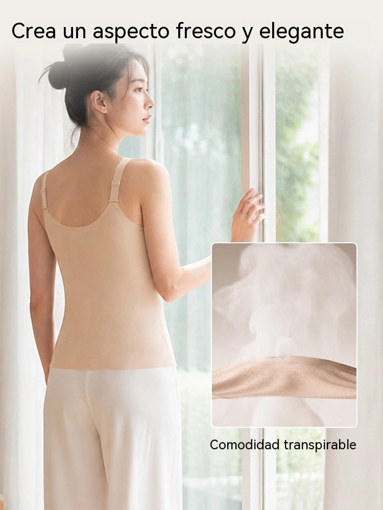 Esta elegante camisola está confeccionada en tejido transpirable de seda helada y presenta una silueta en línea A que disimula perfectamente el abdomen.