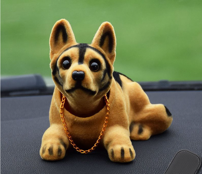 ¡El perro lindo y dominante con la cabeza temblorosa te acompañará para ser próspero en todo momento!