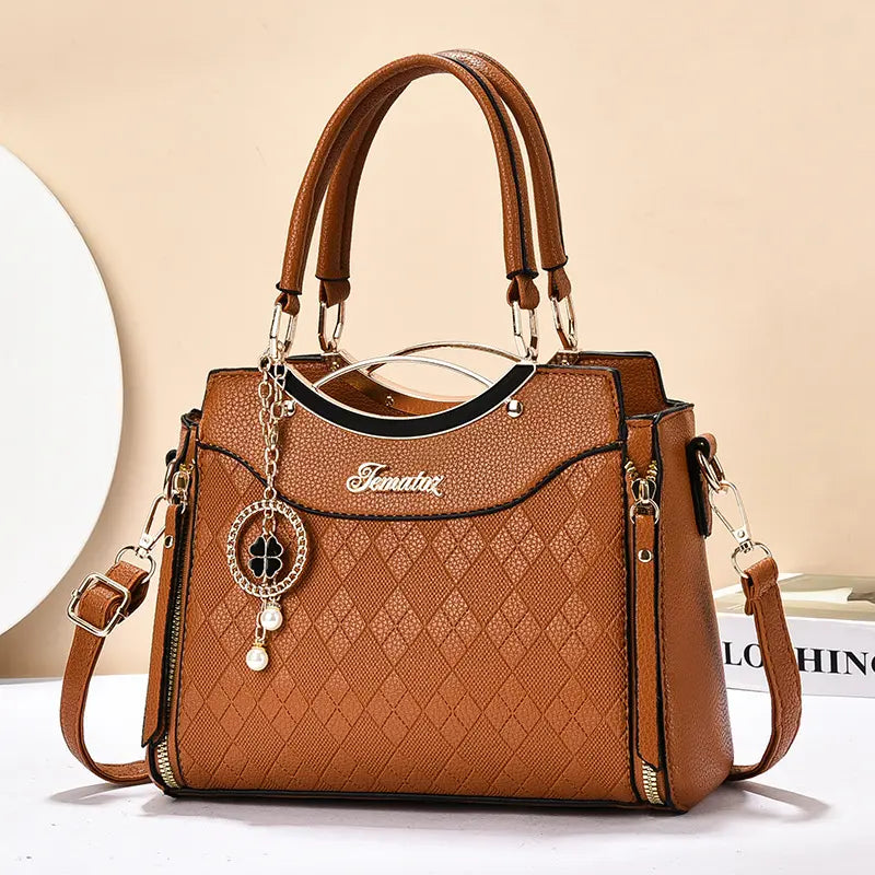 🥰Bolso bandolera para mujer con herrajes dorados, múltiples compartimentos y asa superior.