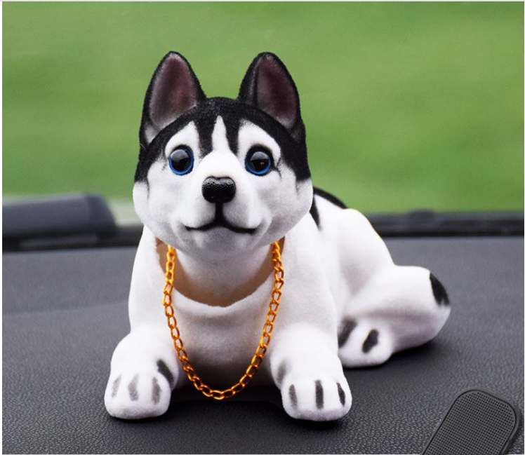 ¡El perro lindo y dominante con la cabeza temblorosa te acompañará para ser próspero en todo momento!
