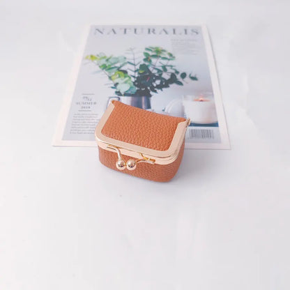🎁【Compra 1 y llévate 1 gratis】💍👜Exquisita y compacta bolsita para joyas, ideal para guardar anillos, pendientes y otras joyas.
