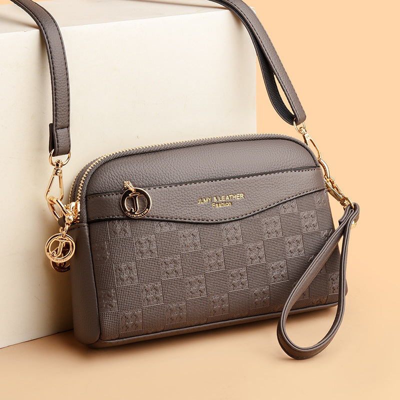 🔥Nuevo bolso para móvil de mujer con diseño en relieve, versátil para desplazamientos, gran capacidad.