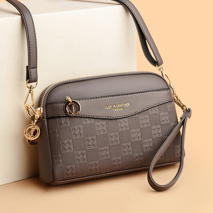 🔥Nuevo bolso para móvil de mujer con diseño en relieve, versátil para desplazamientos, gran capacidad.
