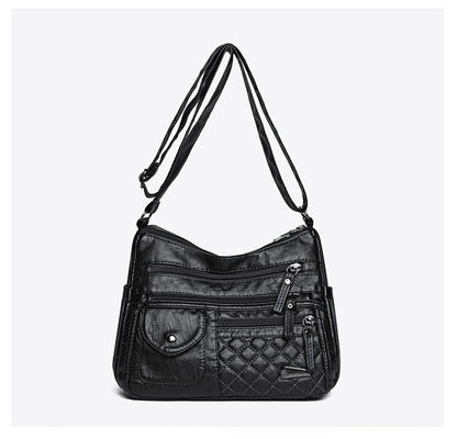 🔥【Oferta por tiempo limitado. Rebajas de fin de año.】Bolso de cuero suave de gran capacidad y múltiples capas para mujer