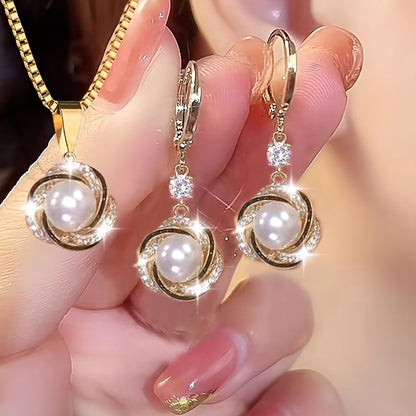 🔥💥（Collar + Pendientes）Colgante de perla con personalidad popular, elegante y versátil