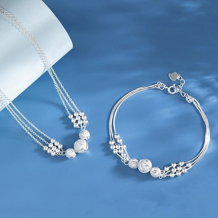 Collar ligero y lujoso + pulsera de cuentas de la suerte