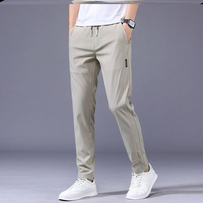 【Compre 1 y obtenga 1 gratis】👖【M-5XL】2026 nuevos pantalones elásticos informales para hombre, cómodos y a la moda