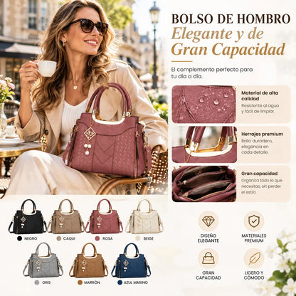 Bolso bandolera para mujer con costuras en forma de V, herrajes dorados, múltiples compartimentos y asa superior.