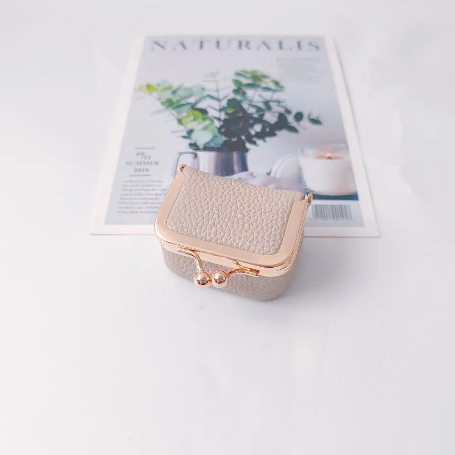 🎁【Compra 1 y llévate 1 gratis】💍👜Exquisita y compacta bolsita para joyas, ideal para guardar anillos, pendientes y otras joyas.