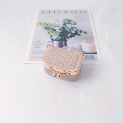 🎁【Compra 1 y llévate 1 gratis】💍👜Exquisita y compacta bolsita para joyas, ideal para guardar anillos, pendientes y otras joyas.