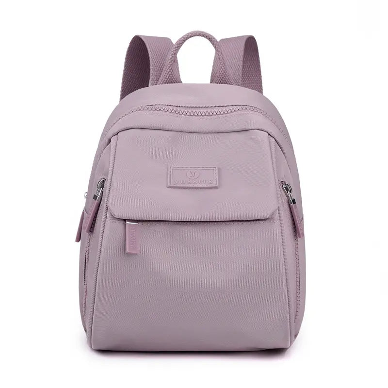 Nueva mochila elegante e informal de gran capacidad y color liso para mujer.