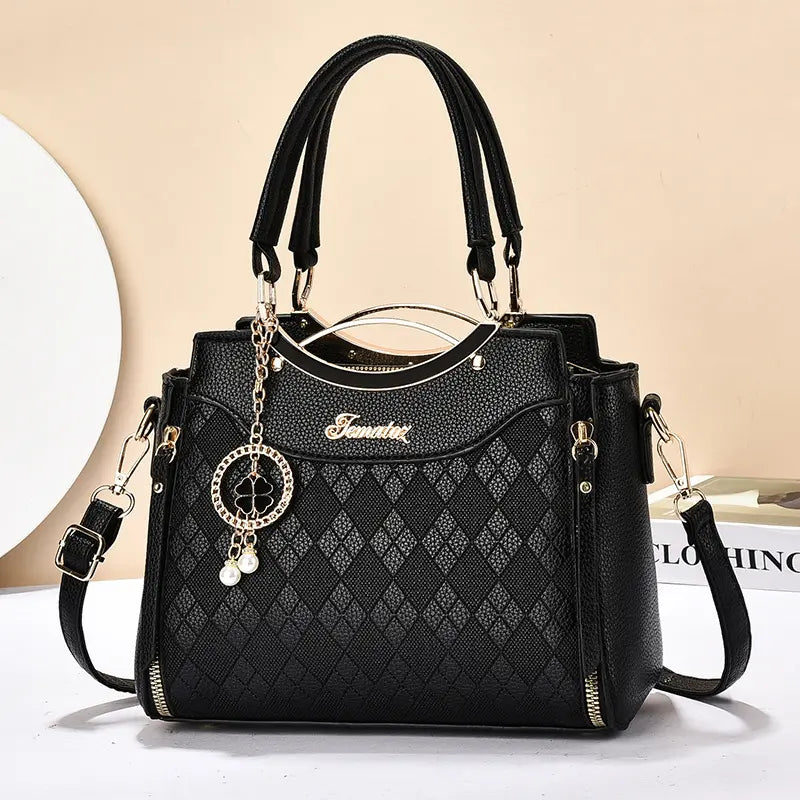 🥰Bolso bandolera para mujer con herrajes dorados, múltiples compartimentos y asa superior.
