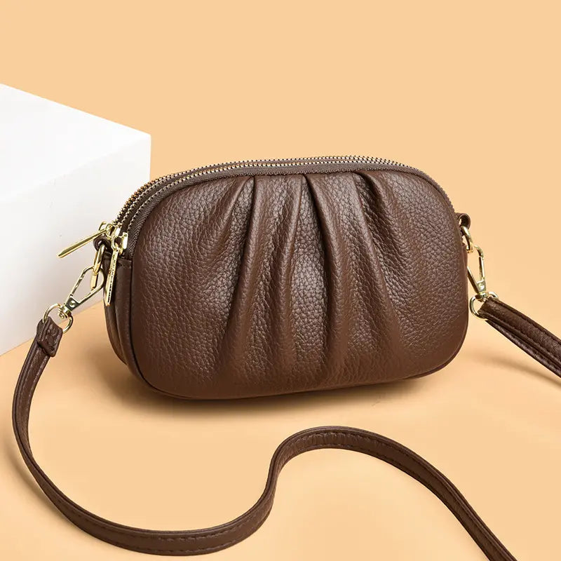 ✨🎀Bolso bandolera de piel con varios compartimentos y forma de concha