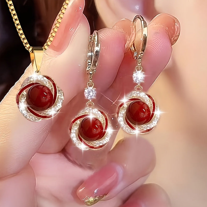 🔥💥（Collar + Pendientes）Colgante de perla con personalidad popular, elegante y versátil